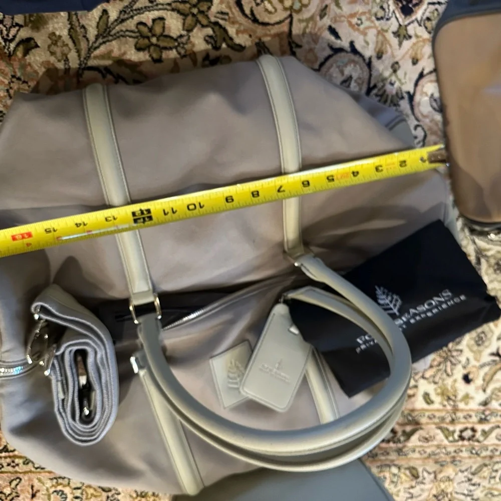 Exclusive Four seasons private jet experience duffel and toiletry kit.  BNWT
